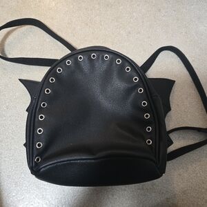 Bioworld- Batwing Mini Backpack purse- black- vegan leather- grommet details